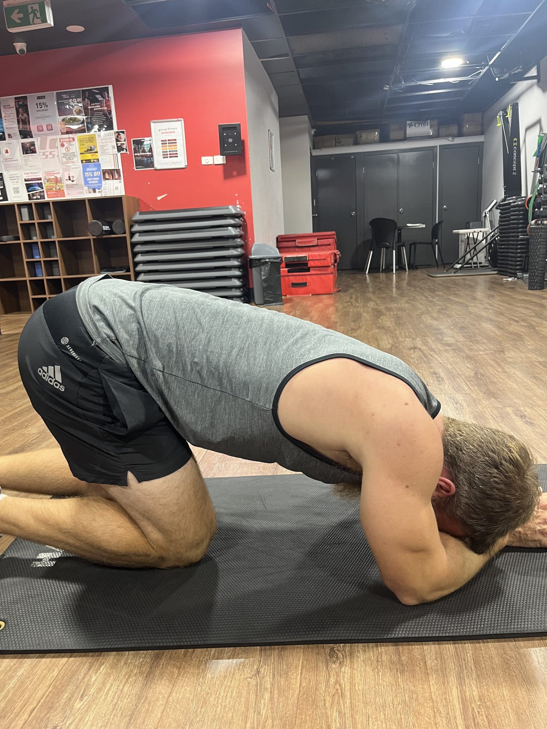 Male lying on ground after high intensity Interval Training exercise